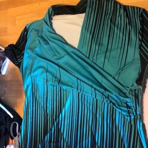 Short sleeve back and turquoise blouse